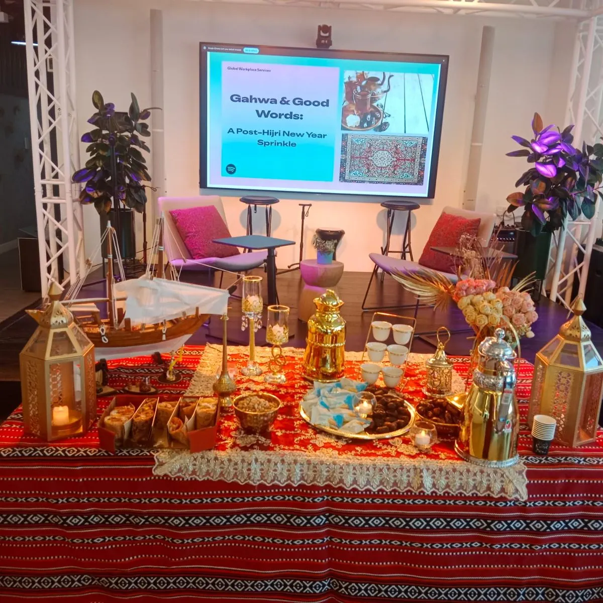 Corporate desert camp setup with staging for a Yas Island offsite