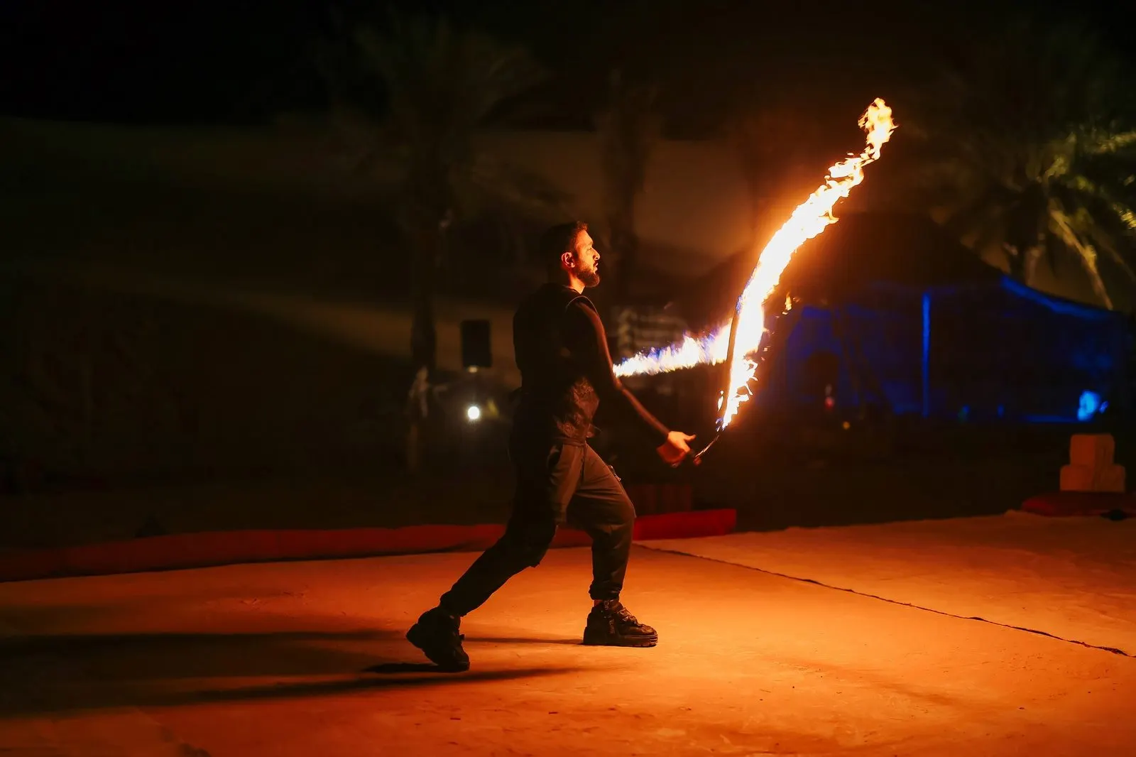 Evening cultural programme lit at an Abu Dhabi desert venue