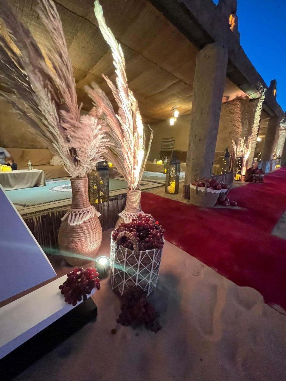 Pampas grass and lantern styling at a Sparkling Sandset gala dinner