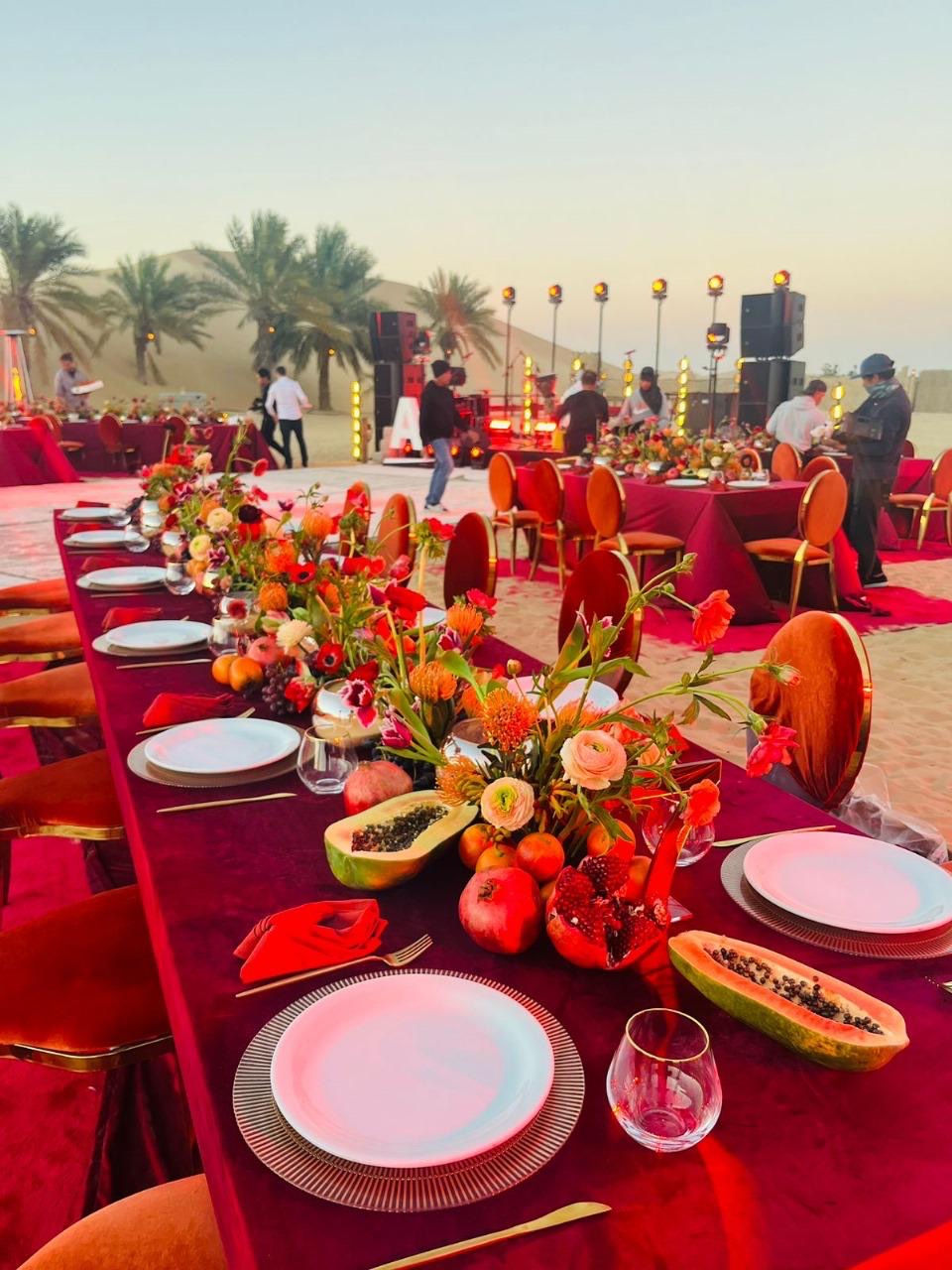 Gala dinner tablescape with florals, produced by Sparkling Sandset
