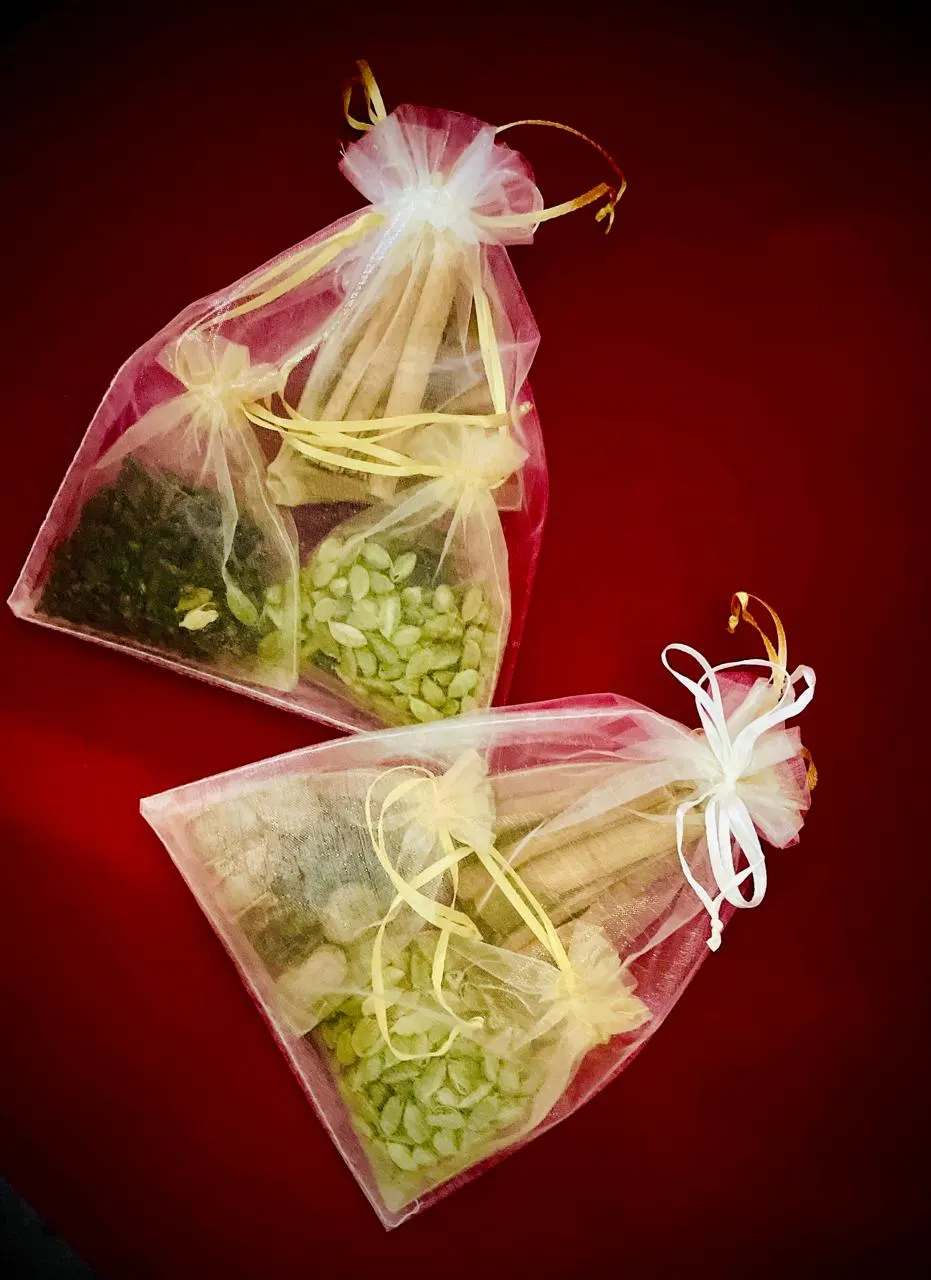 Organza pair gift wrapping used for a corporate favour order in Abu Dhabi