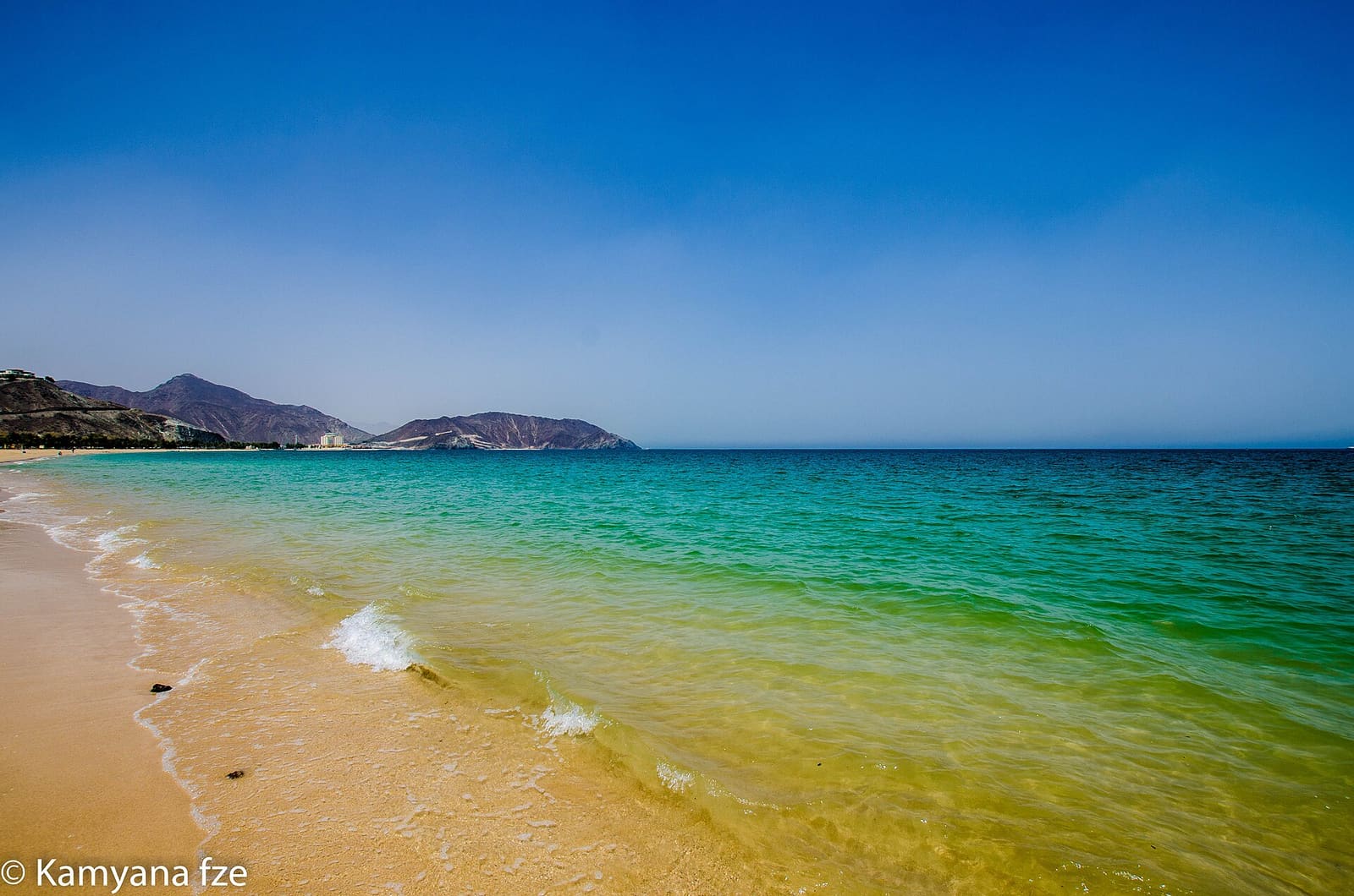 Turquoise water and sand at Khor Fakkan